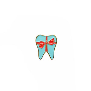
            
                Load image into Gallery viewer, Specialty Tooth Pin - Turquoise Present with Red Bow
            
        