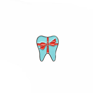 
            
                Load image into Gallery viewer, Specialty Tooth Pin - Turquoise Present with Red Bow
            
        
