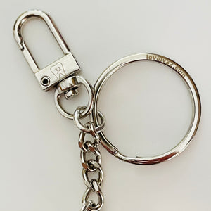
            
                Load image into Gallery viewer, Happy Tooth - Purple Glitter Key Ring
            
        