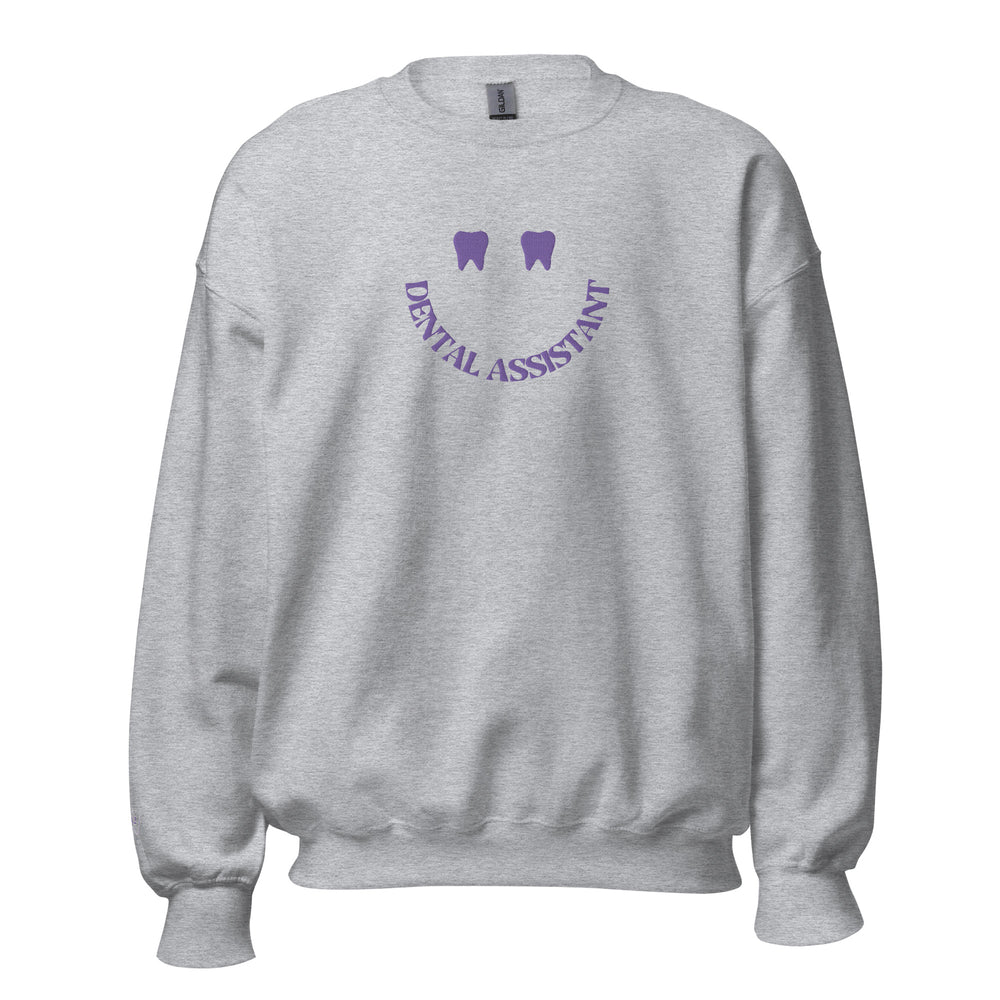 
            
                Load image into Gallery viewer, Dental Assistant Tooth Smile Sweatshirt Purple Embroidery
            
        